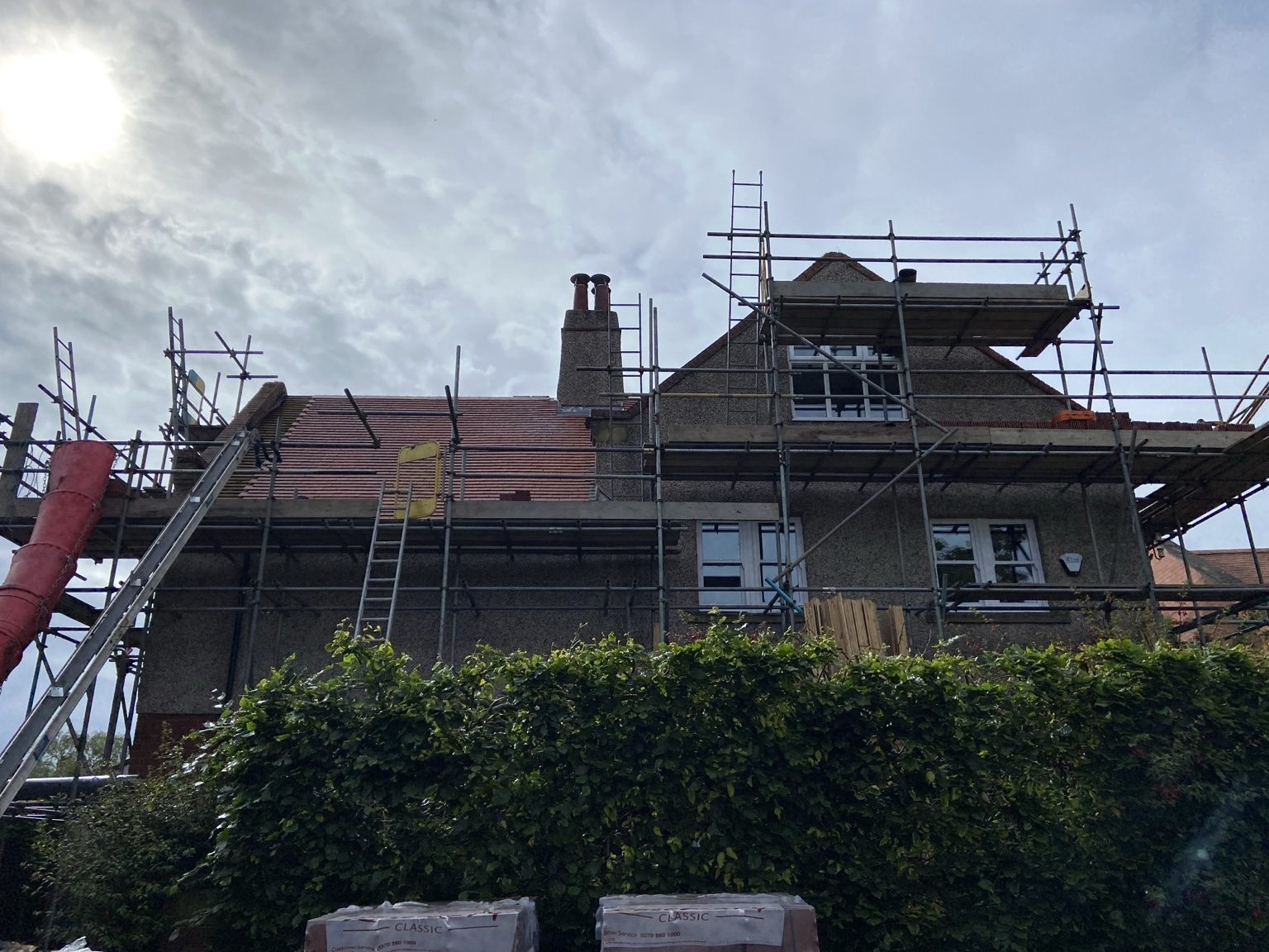 DWS team working on a roof